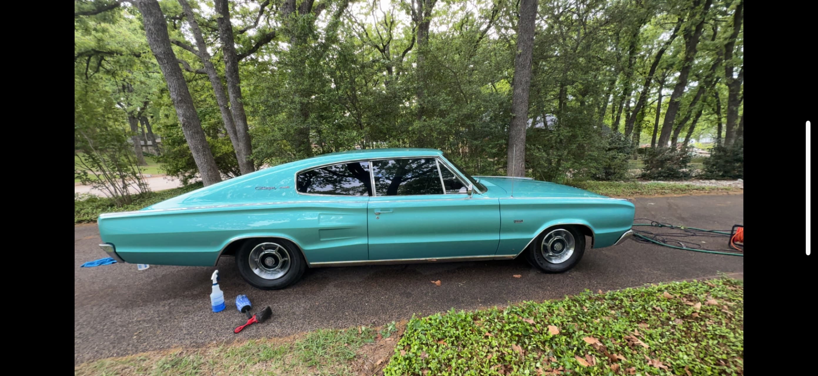 Teal classic Dodge Charger after an exterior detail